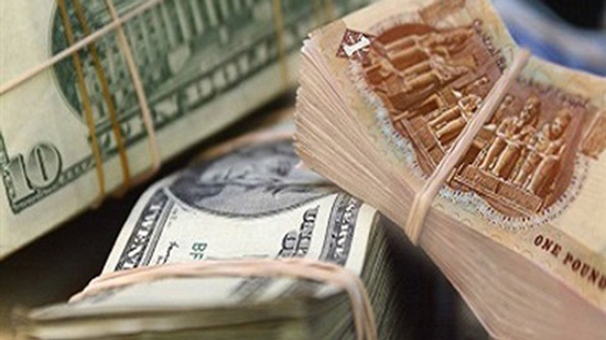 الدولار والجنيه - صورة أرشيفية
