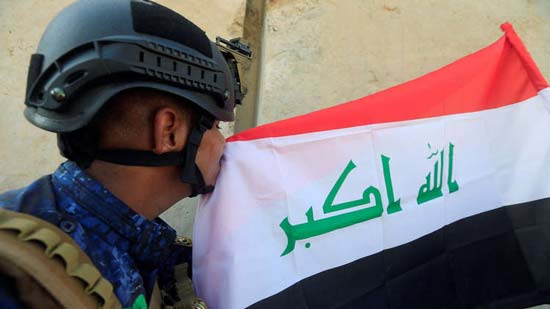 القوات العراقية وسط كركوك والعبادي يأمر برفع علم البلاد