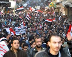 متظاهرون في أسيوط يهتفون  ضد مرسي : لو عبد الناصر عايش ،كان لبسكم طُرَح وغوايش