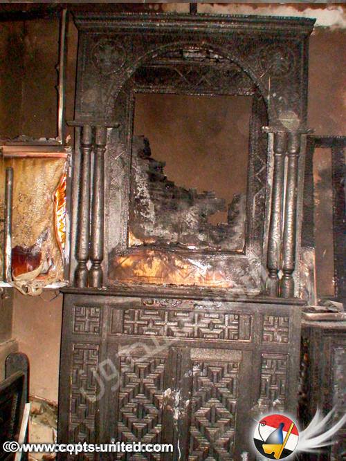 آثار الحريق بأيقونات الكنيسة