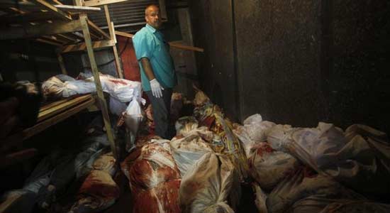 ثلاجات الخضار تحتفظ بجثث ضحايا القصف الإسرائيلي في غزة