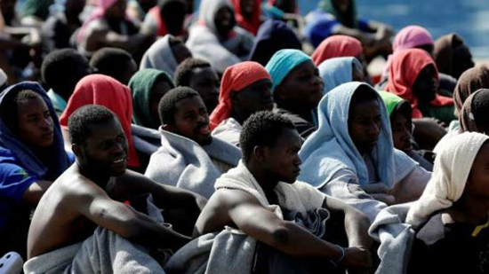الجارديان:اللاجئين يباعون في سوق الرقيق في ليبيا