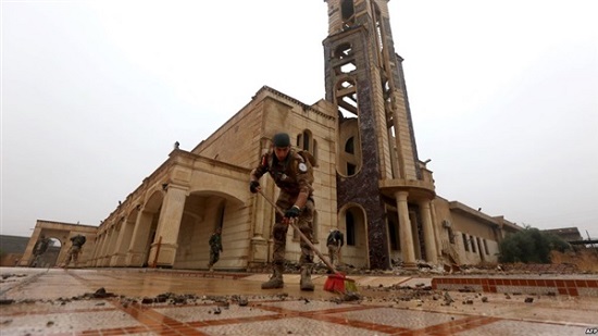  مسيحيون الموصل يستعيدون منازلهم من داعش

