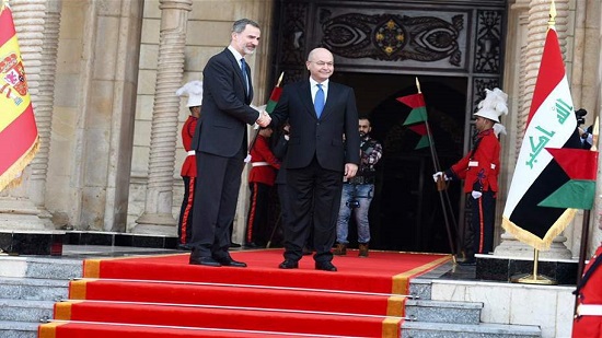  رئيس العراق يستقبل ملك إسبانيا ويدعوه للمشاركة في أعمار العراق 
