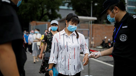 الصين تسجل 12 حالة إصابة جديدة بـ«كورونا»