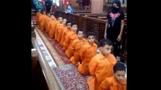  تمثيل اطفال بإحدى الكنائس لمذبحة شهداء ليبيا
