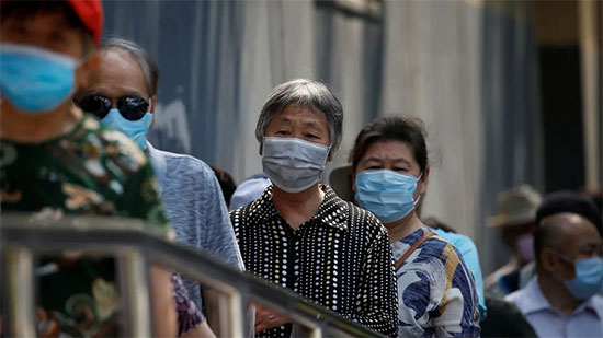 خبراء منظمة الصحة يطلبون الصين بيانات جديدة بشأن أولى إصابات كورونا