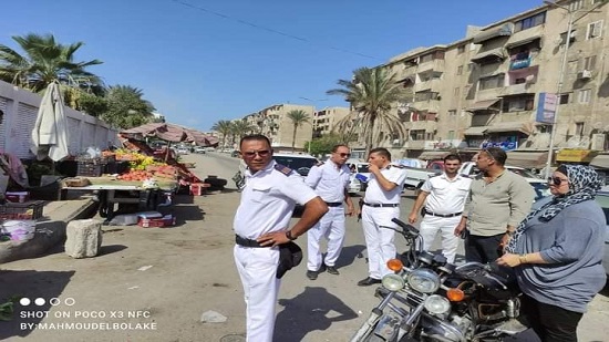  استمرار أعمال إزالة الاشغالات والتعديات بأحياء بورسعيد